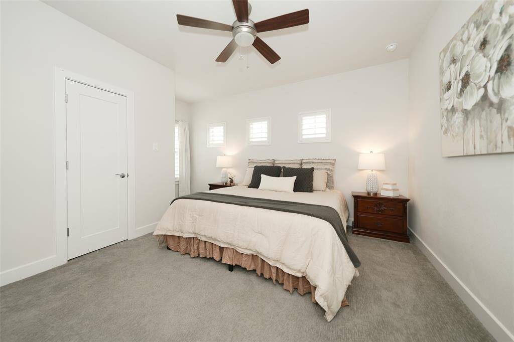 Upstairs, discover three spacious bedrooms, each with a private bathroom and walk-in closet—ideal for comfort and convenience.