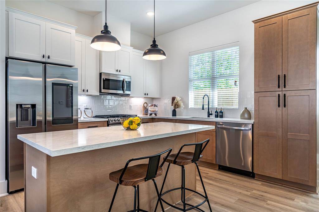 Convenient built-in pantry offers ample storage space for all your kitchen essentials, keeping everything organized and within reach.