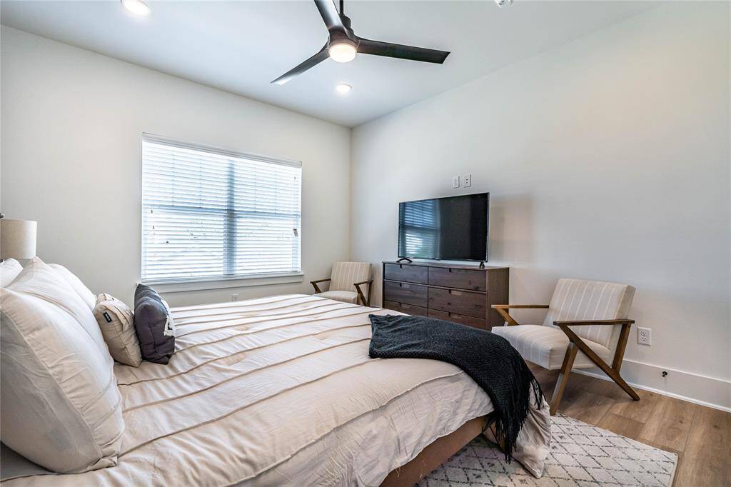 Another view of the primary bedroom