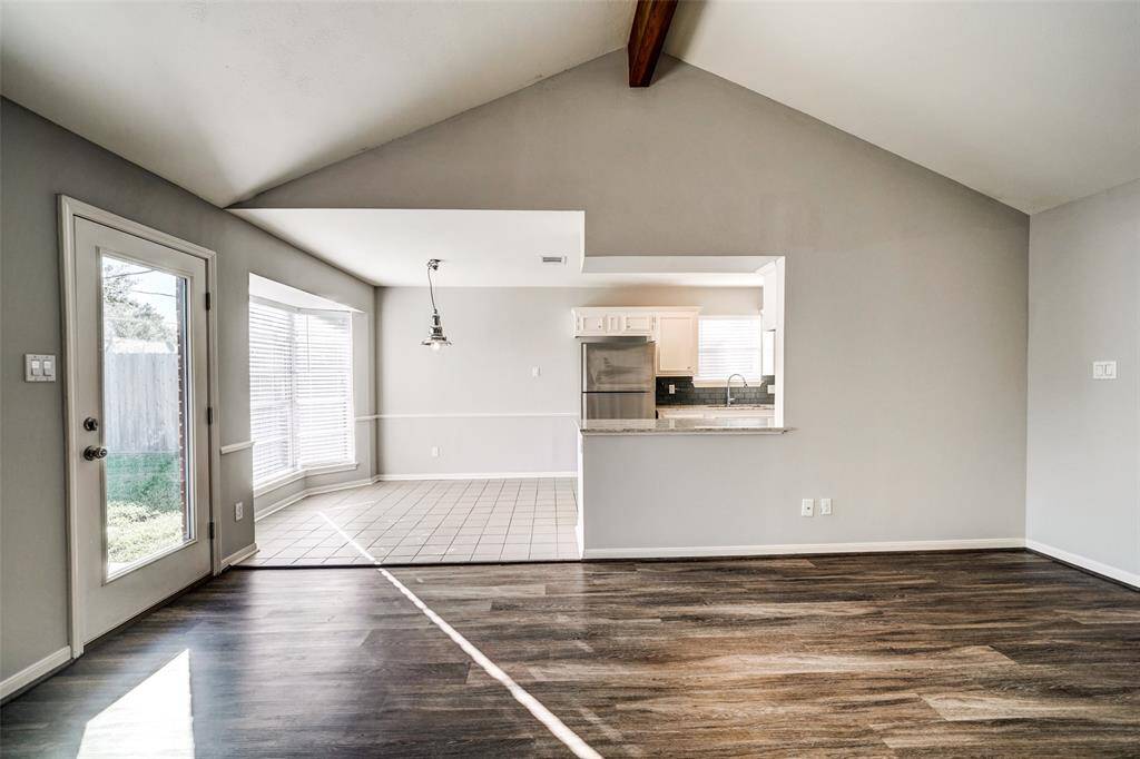 Living room leads into the convenient breakfast nook.