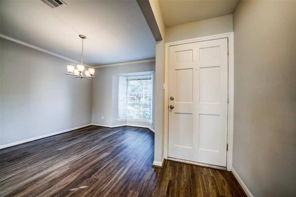 Entry way feeds into the formal dining room to your right. Formal dining could also be an office or 2nd living space, etc.
