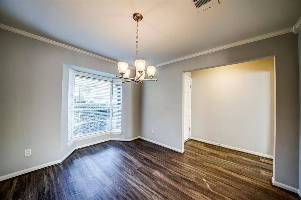 Dining room leads directly to the kitchen or follow the entry way into the living room.