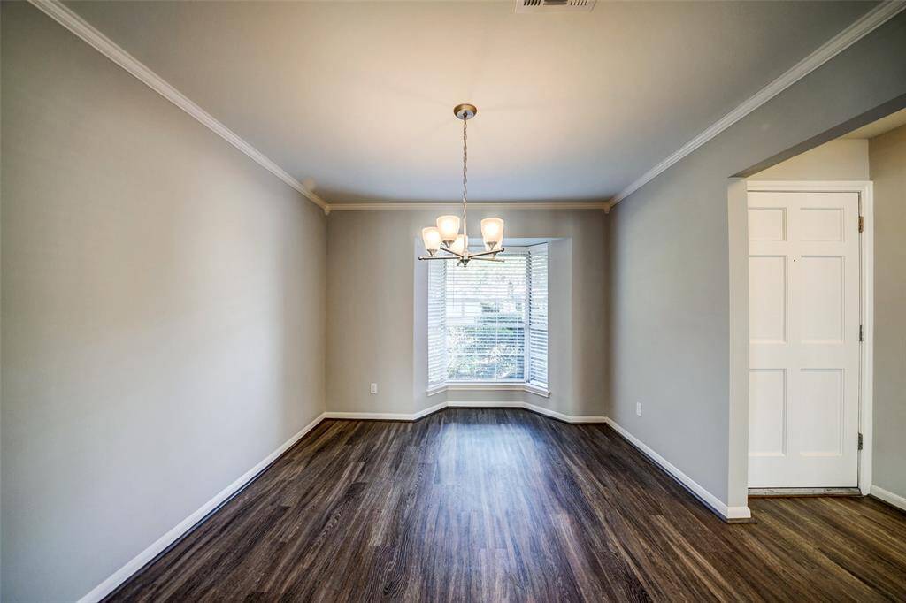 With a breakfast nook off the kitchen, this could also make a great office or second living space.