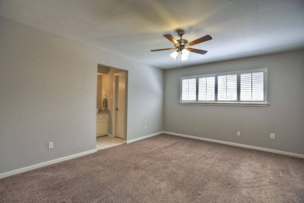 Primary bedroom with windows aligned to bring in light yet not be blocked by your bed or furniture. Ensuite bath iwith walk-in closet.