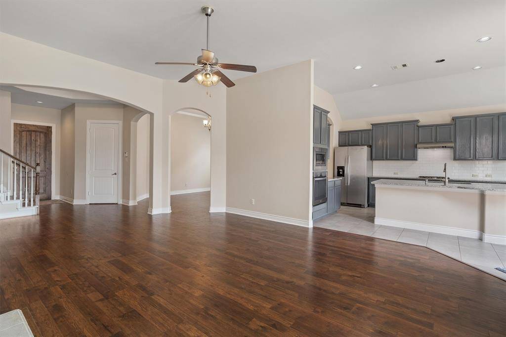 Another view of open concept living room that looks into the kitchen. Perfect for entertaining.