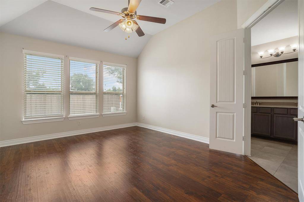 Primary bedroom with amazing space, tall ceilings, and natural light.