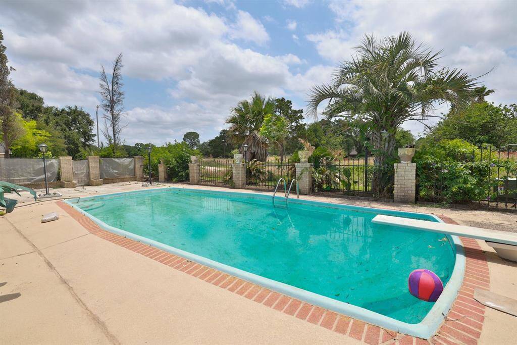 Great one story home on secluded corner lot with no back neighbors! Make this your home today and splash all summer long. Never flooded.