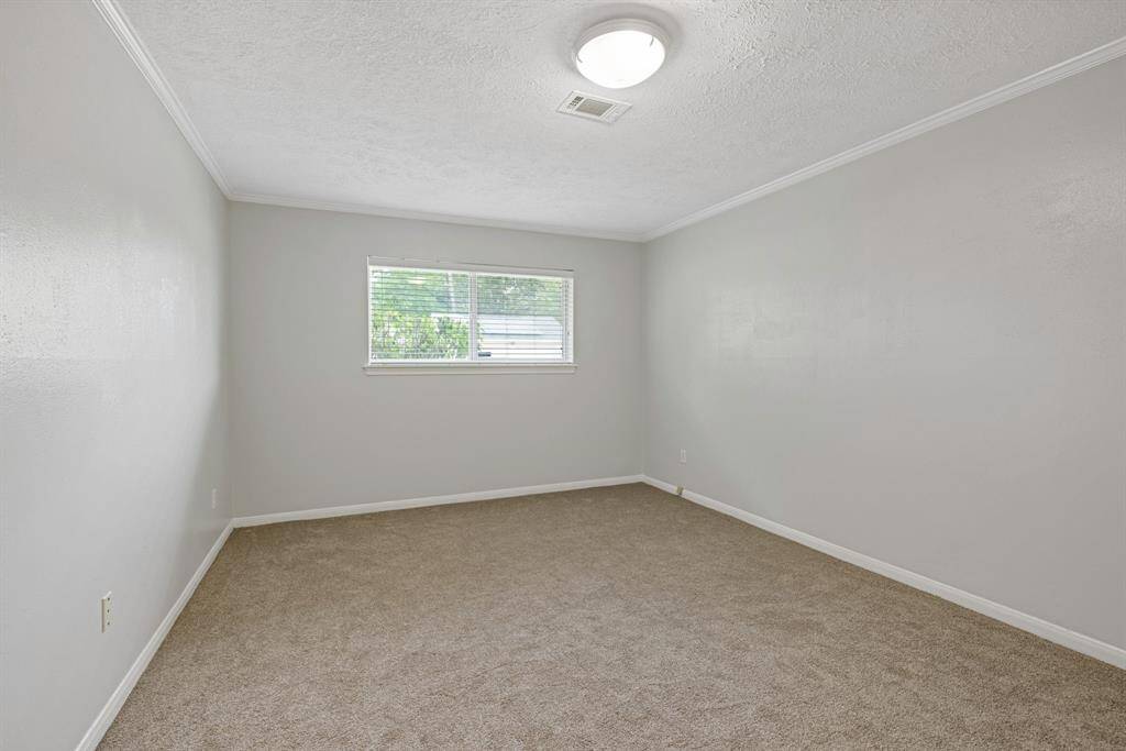 In the front left corner of the home, off the front entry are the secondary bedrooms and bath.