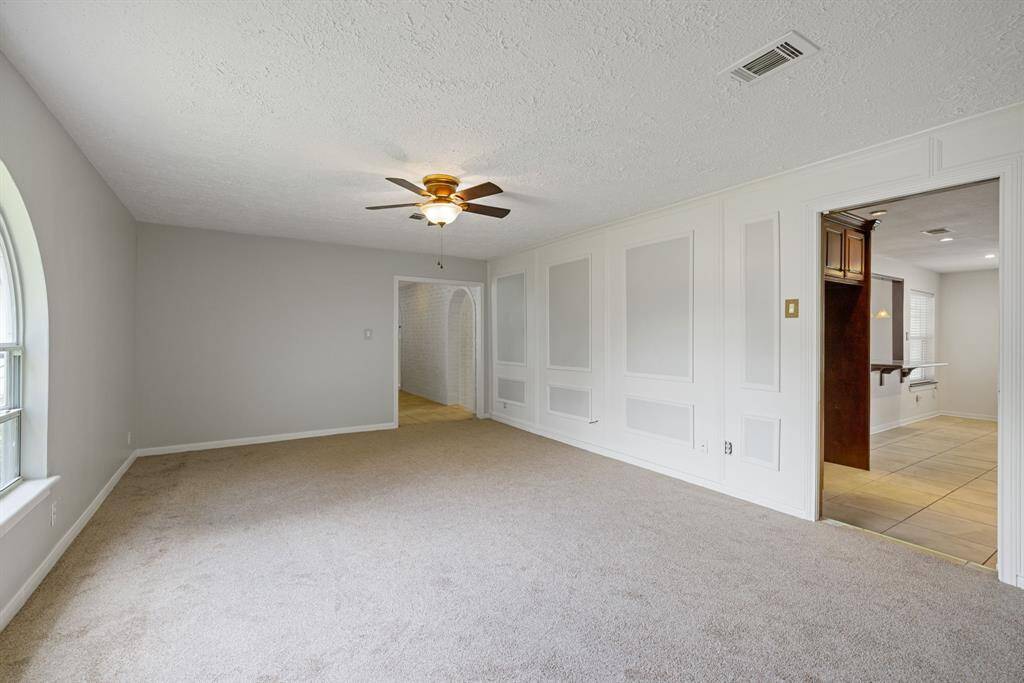 To the right these rooms are directly connected to the kitchen, the center exits to the front door and family room center right.