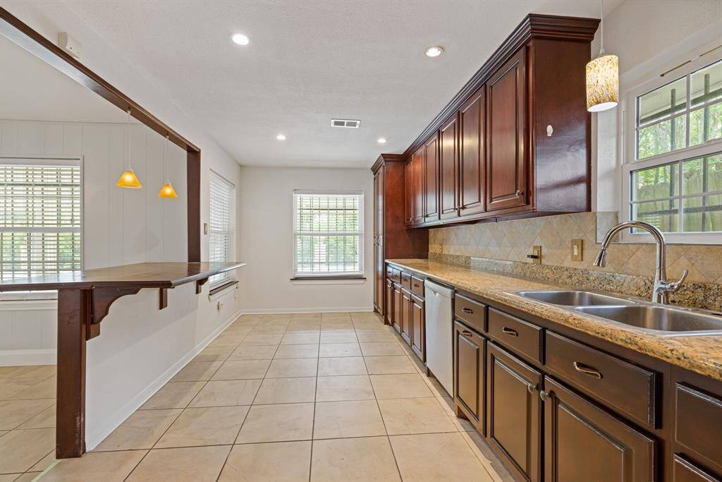 Nicely opened to the family room with storage abound!