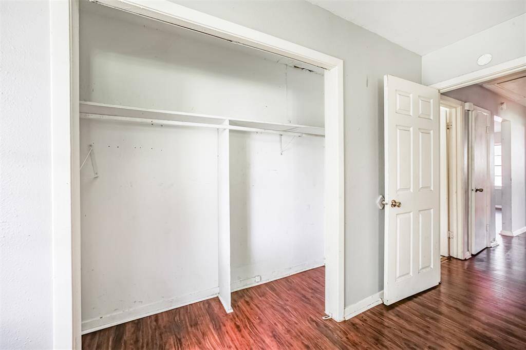 Generously sized closet space adds functional storage. A fresh coat of paint and updated shelving make for a simple improvement project.