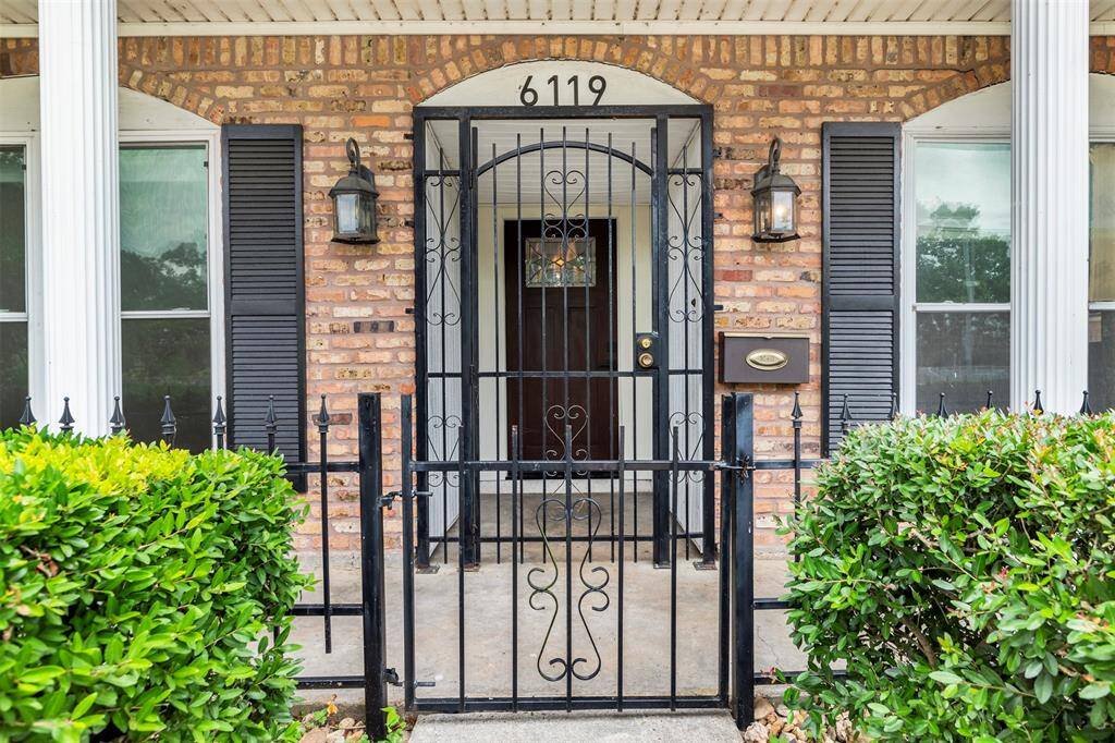 Charming gated entrance offers privacy and elegance.