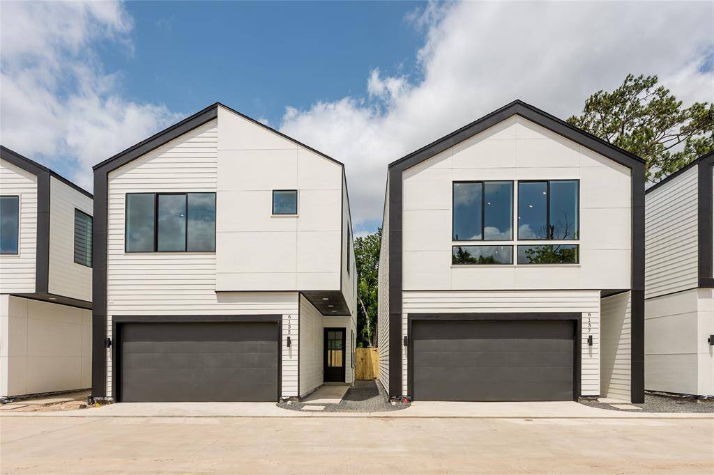 Modern two-story freestanding home located in a brand-new gated community, combining contemporary design with added security and exclusivity.