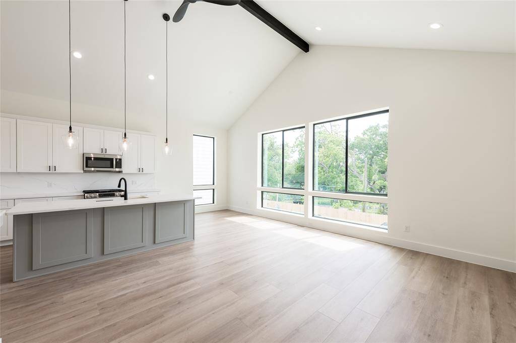 View of the elegant dining area, perfectly positioned adjacent to the kitchen and living spaces—ideal for hosting memorable meals and gatherings.