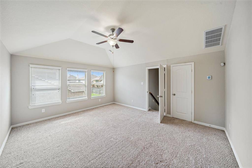 Gameroom with half bath perfect for entertaining or to be used as a bonus room
