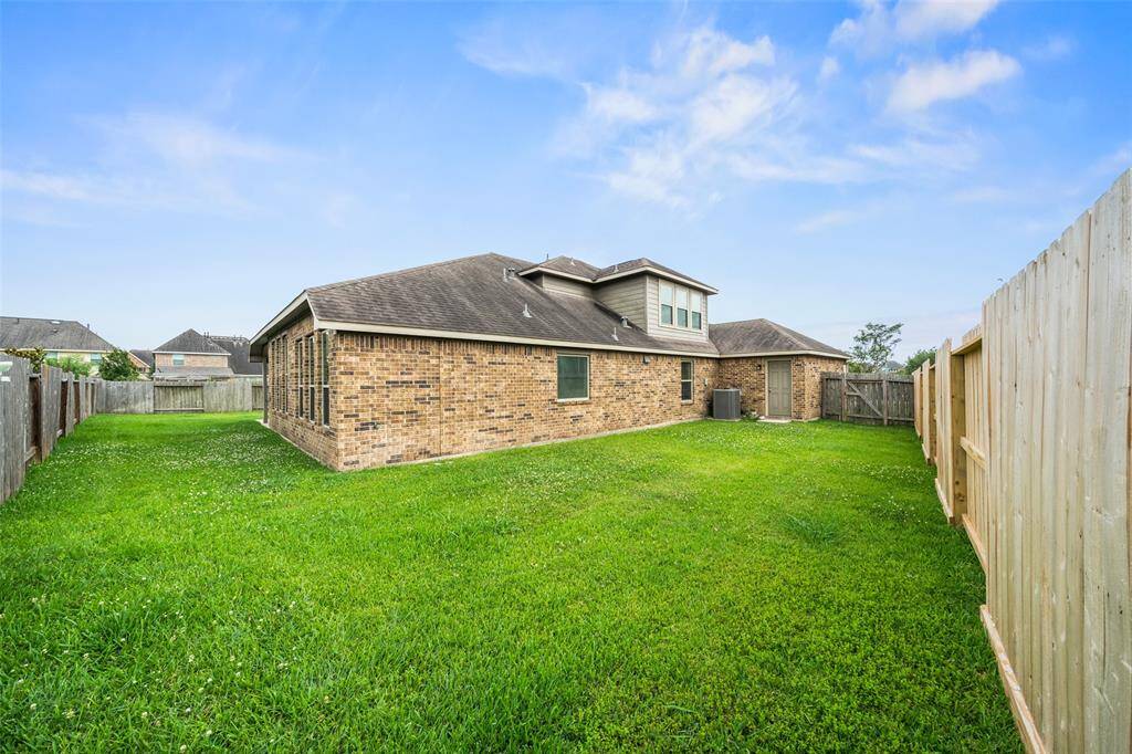 4-sided brick for low maintenance with ample side yard on both sides of home.