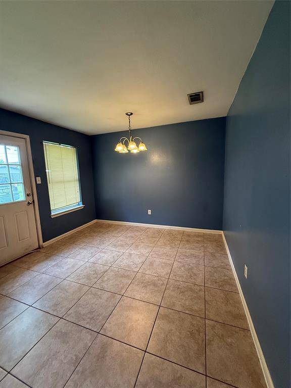 DINING AREA LEADS TO THE BACKYARD