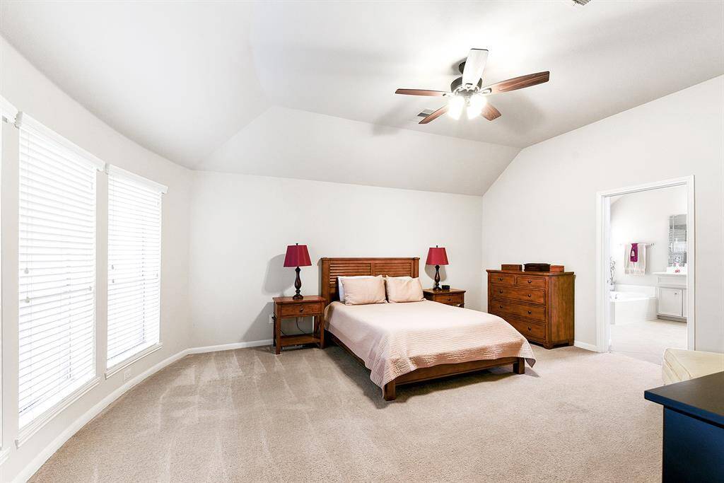 Spacious Primary Bedroom w/ bay windows