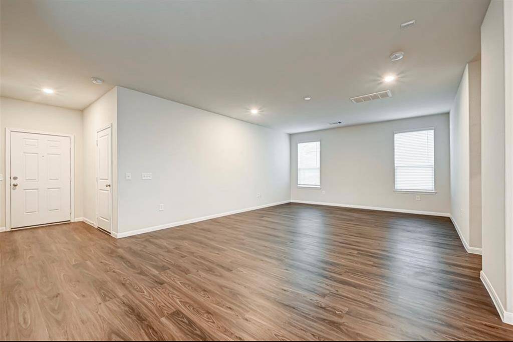 Spacious living room with luxury vinyl