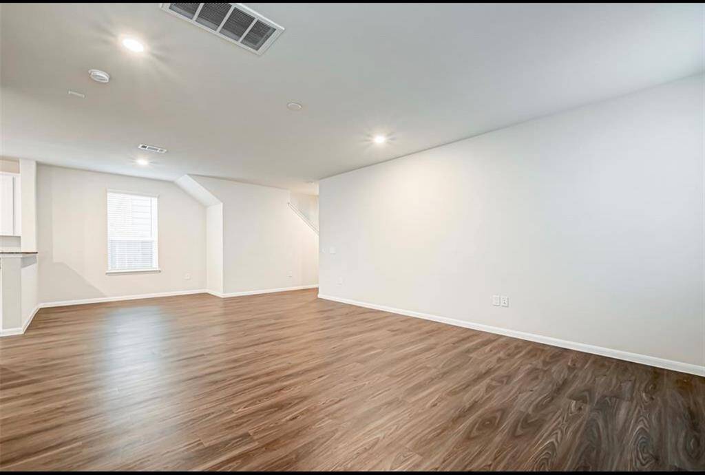 Spacious living room with luxury vinyl