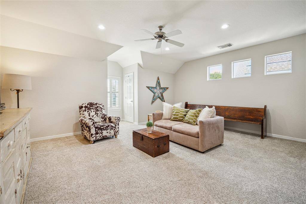 The huge game room has plenty of space for your favorite game table, toys, media equipment and more!
