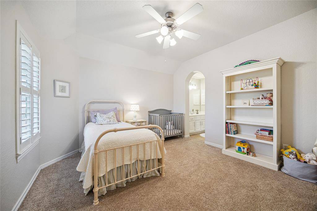 The last of three secondary bedrooms upstairs.