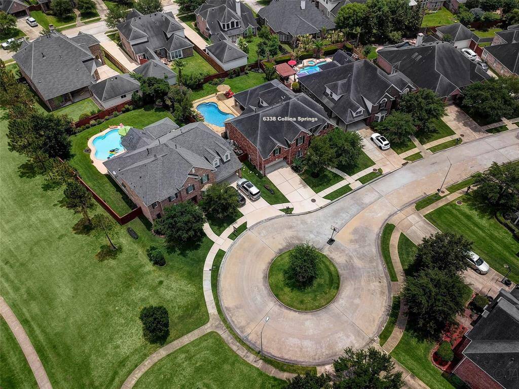 Ideally located on a cul-de-sac street that opens to green space with a walking trail. *This photo is from a previous listing.