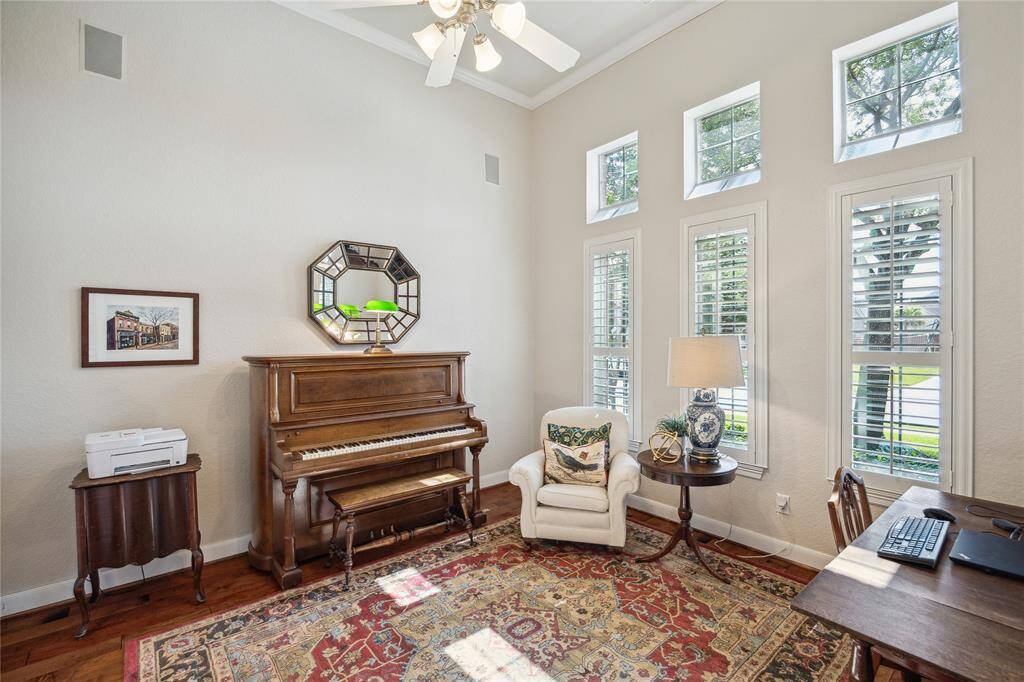 French doors allow for additional privacy while built-ins provide storage and organization.