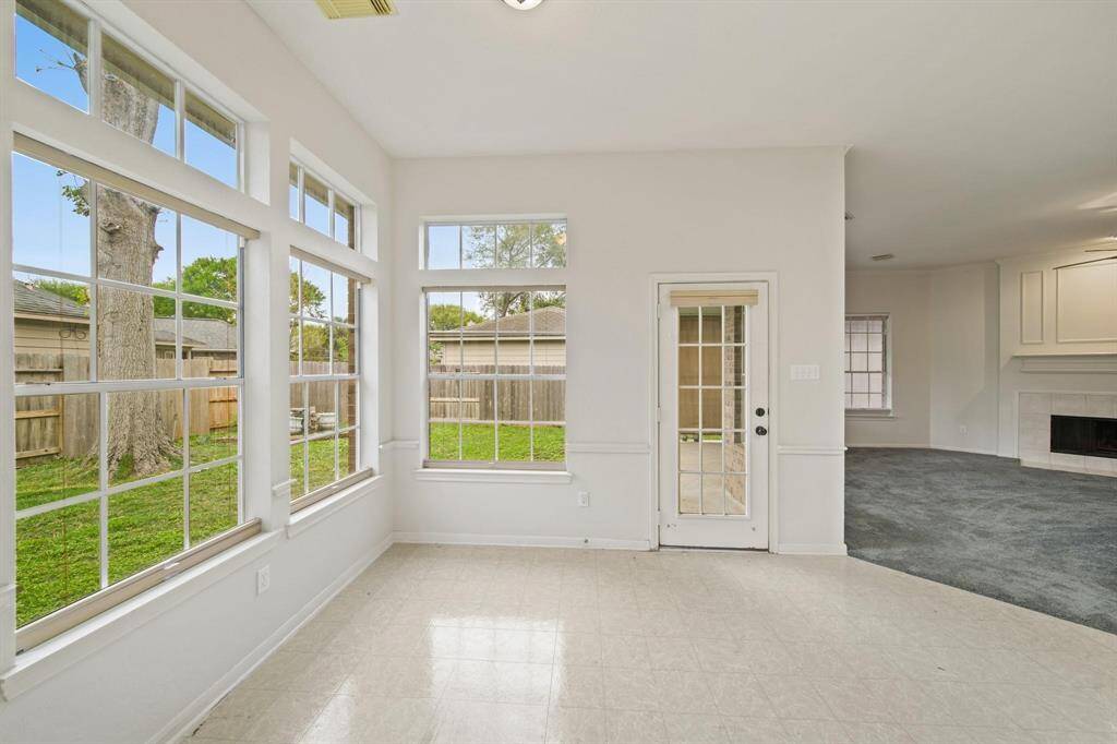 Enjoy seamless indoor-outdoor living with direct access to the backyard.