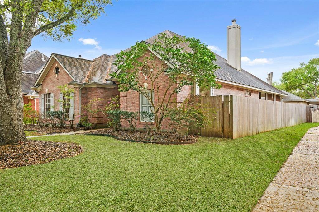Beautifully maintained landscape enhances the property’s overall aesthetic and creates a peaceful outdoor ambiance.