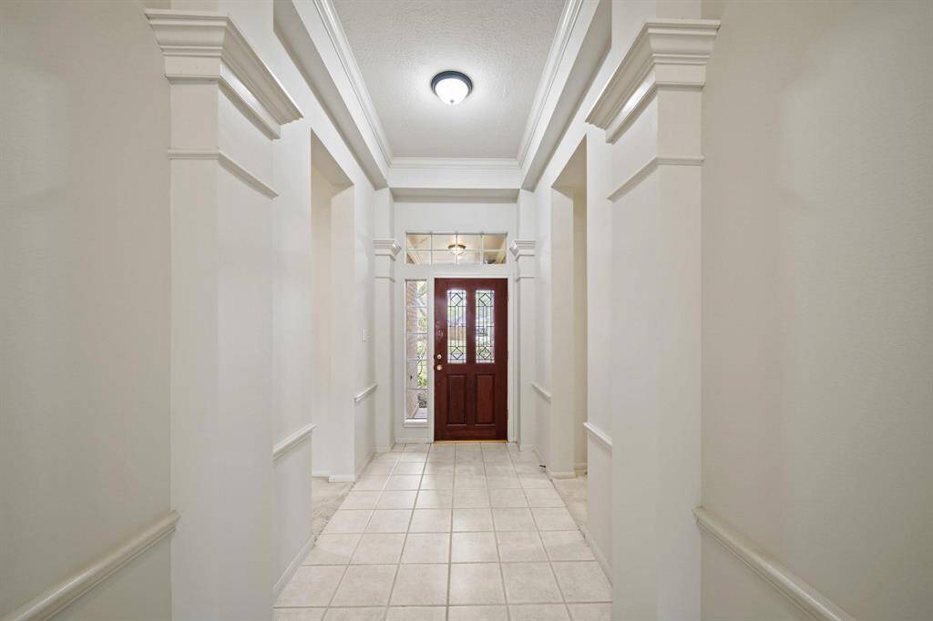 From within the home, the foyer showcases a spacious entrance with clean lines.
