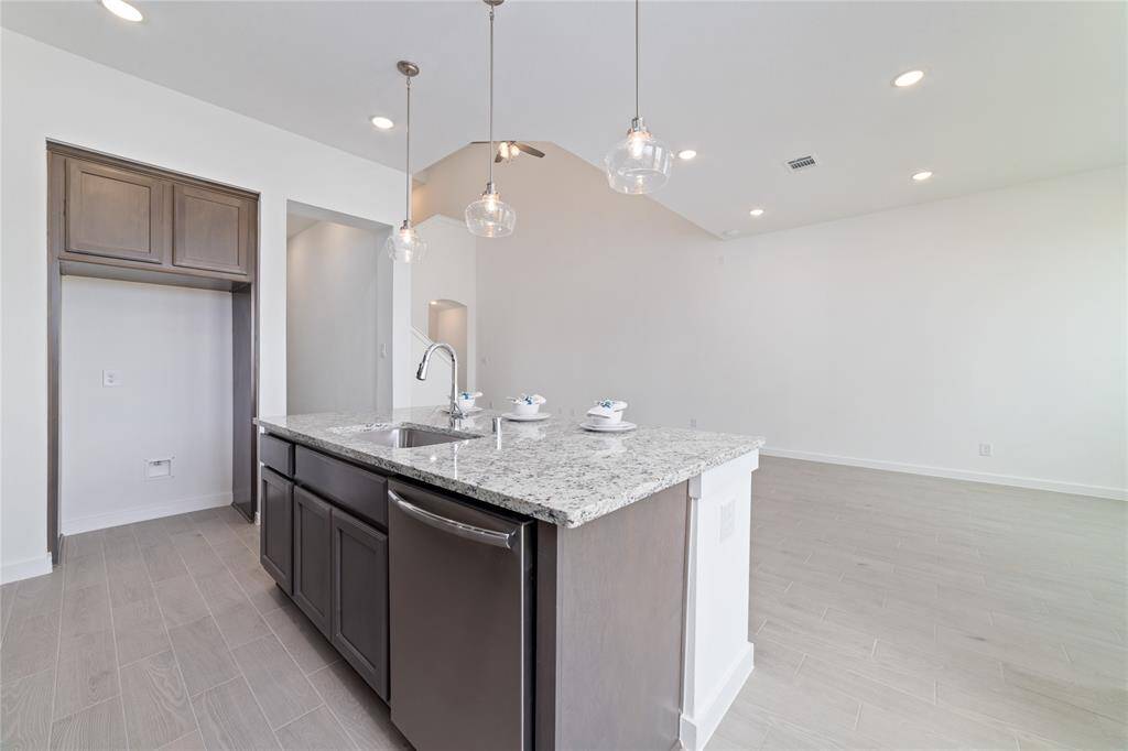 Opposite view of the kitchen.