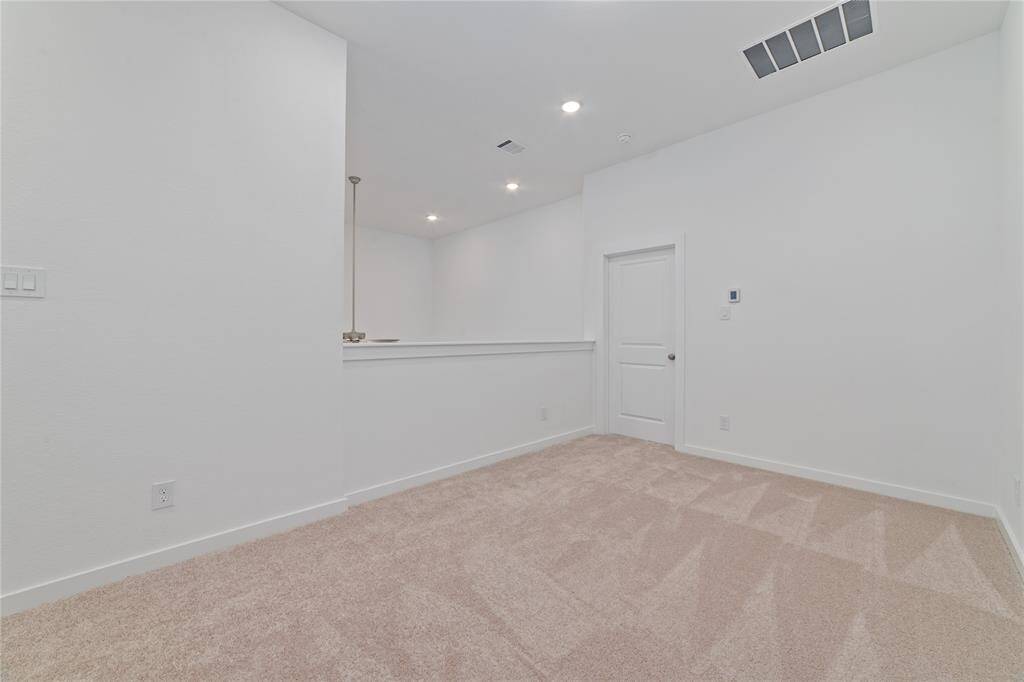 Top of the landing on 2nd floor has a loft that can be used as a flex-space, study area, or office area