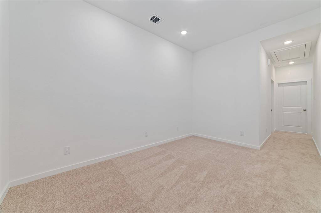 Wide view of the loft area at the top of the stairs has plenty of possibilities