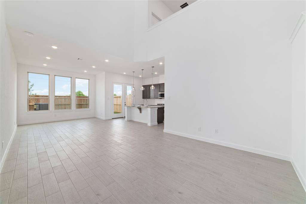 Spacious open concept floorplan with living/dining/kitchen combined has plenty of possibilities