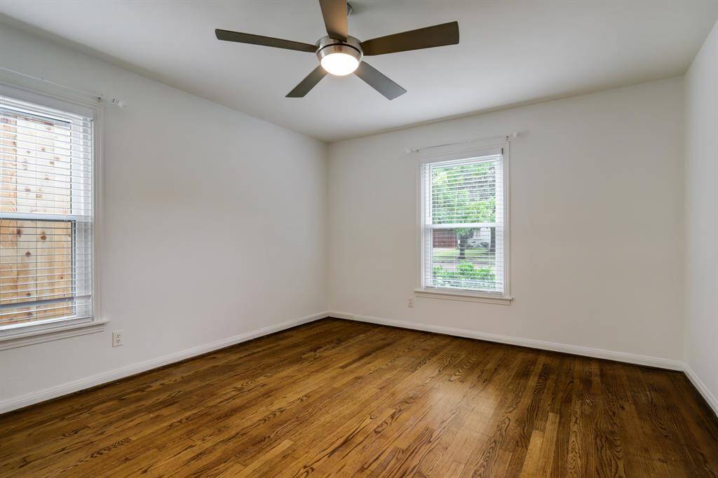 Downstairs bedroom. Room has 2 closets and beautiful hardwood floors. Could be a great bedroom of home office.