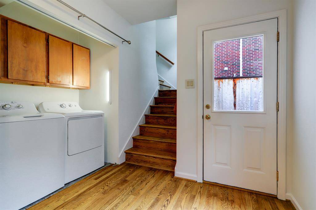 Full size Washer/Dryer. Back stairway leads to upstairs bedrooms.