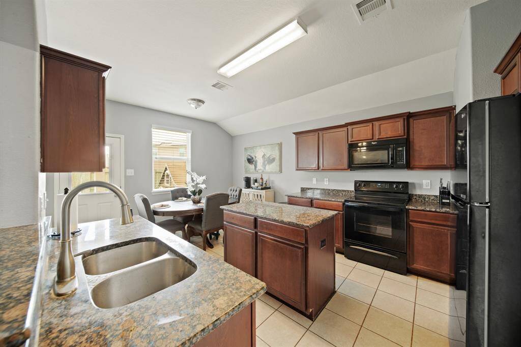 The Kitchen has Granite Counters, Ample Storage and Two Pantry.