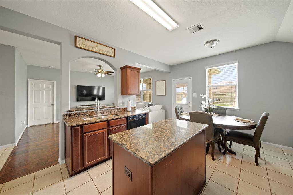The Open Floorplan Concept Incorporates the Breakfast - Kitchen and Living Areas.