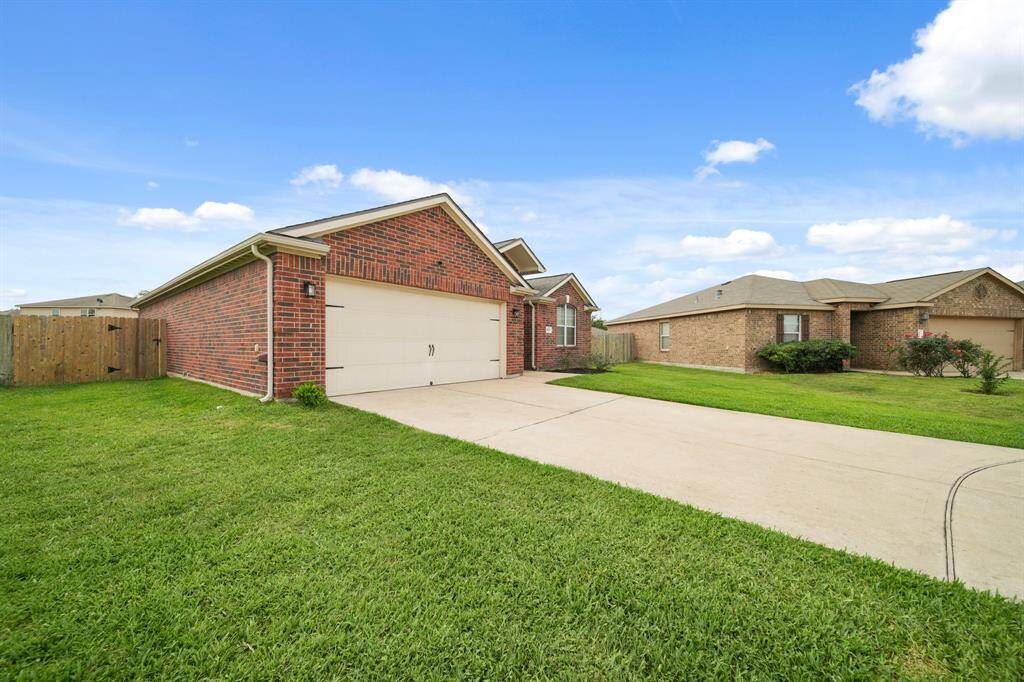 Two Car Garage with Additional Parking with Double Wide Private Driveway.