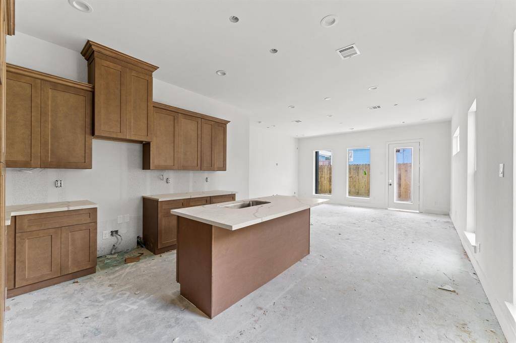 Expansive first floor living with an open-concept design. *Photos taken in early June*