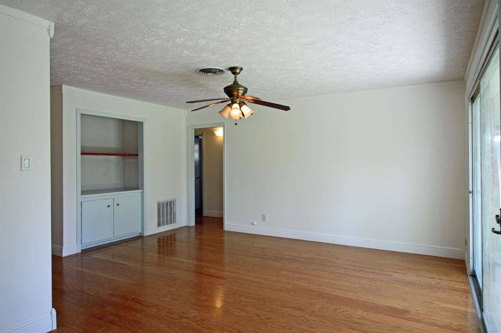Living room with sliding door to backyard