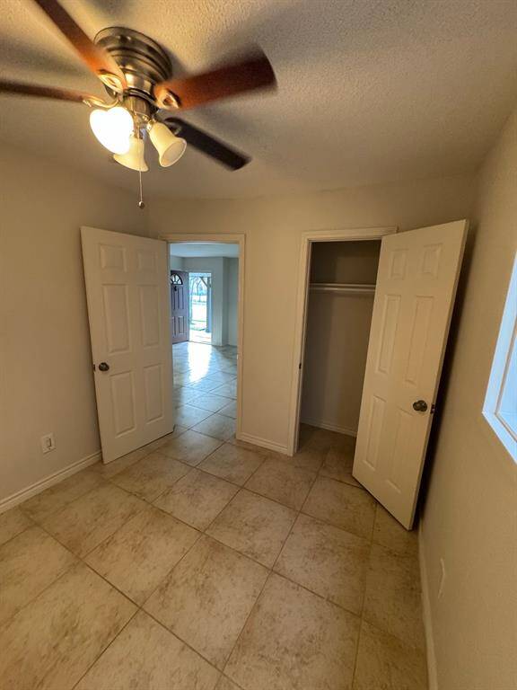 small bedroom on the 1st floor with closet