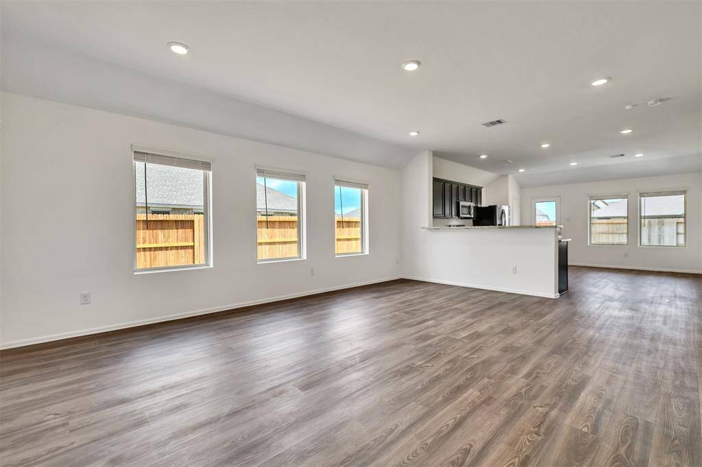 The large family room is open to the kitchen