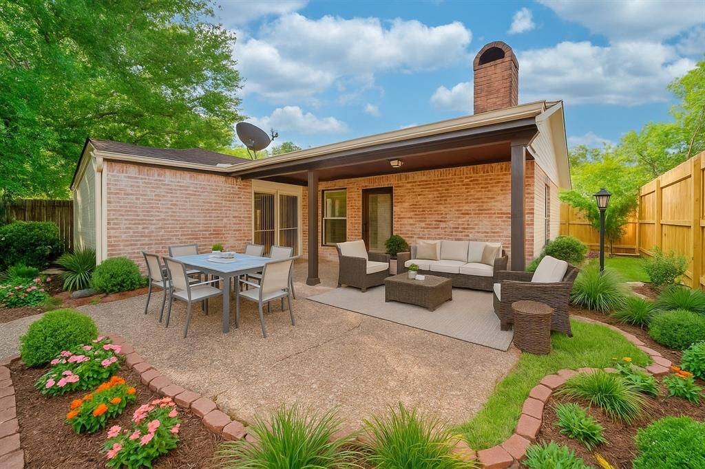 Virtually staged backyard with furniture and landscaping