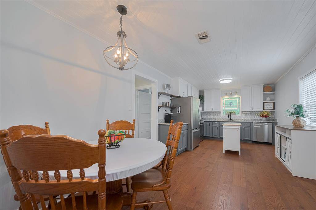 Breakfast nook and a grand kitchen.