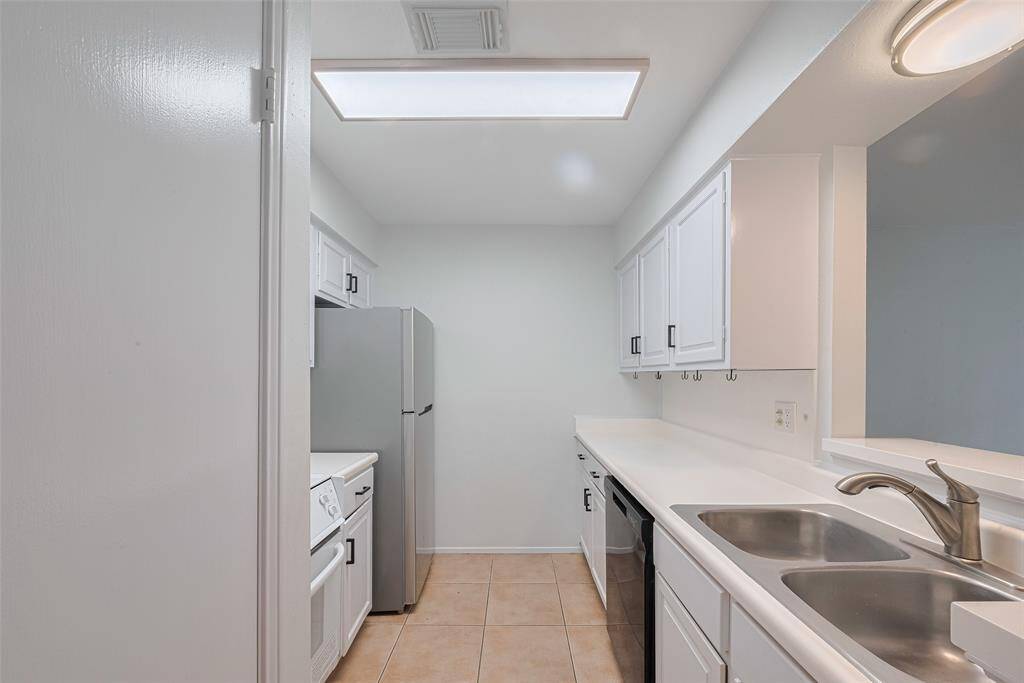 The kitchen space adjoins and is open to the living room!