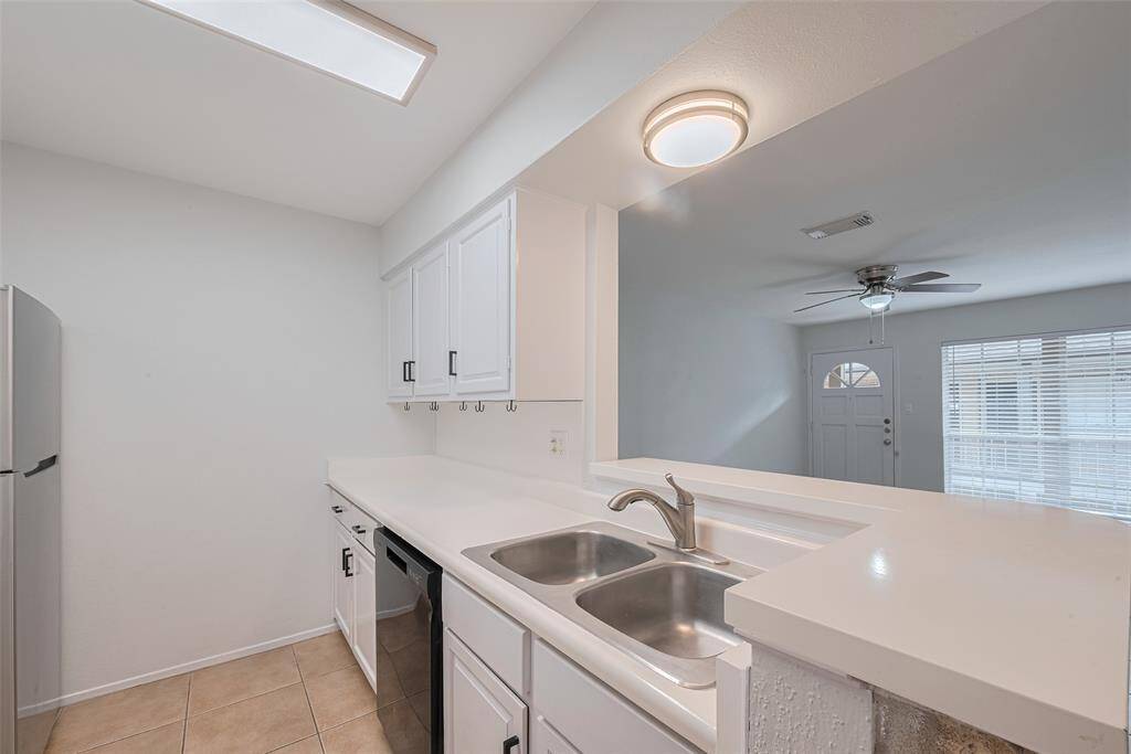 The Open space between the kitchen and living room makes the home open and perfect for entertaining!