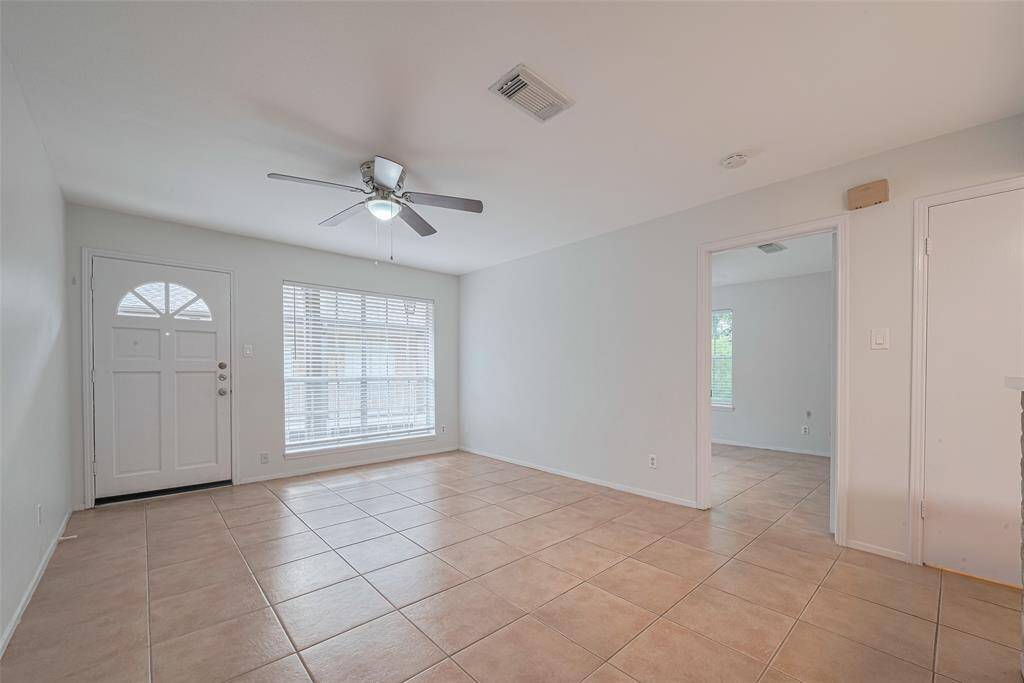 The Living Room features a beautiful window making it light and bright and opens into the spacious bedroom!