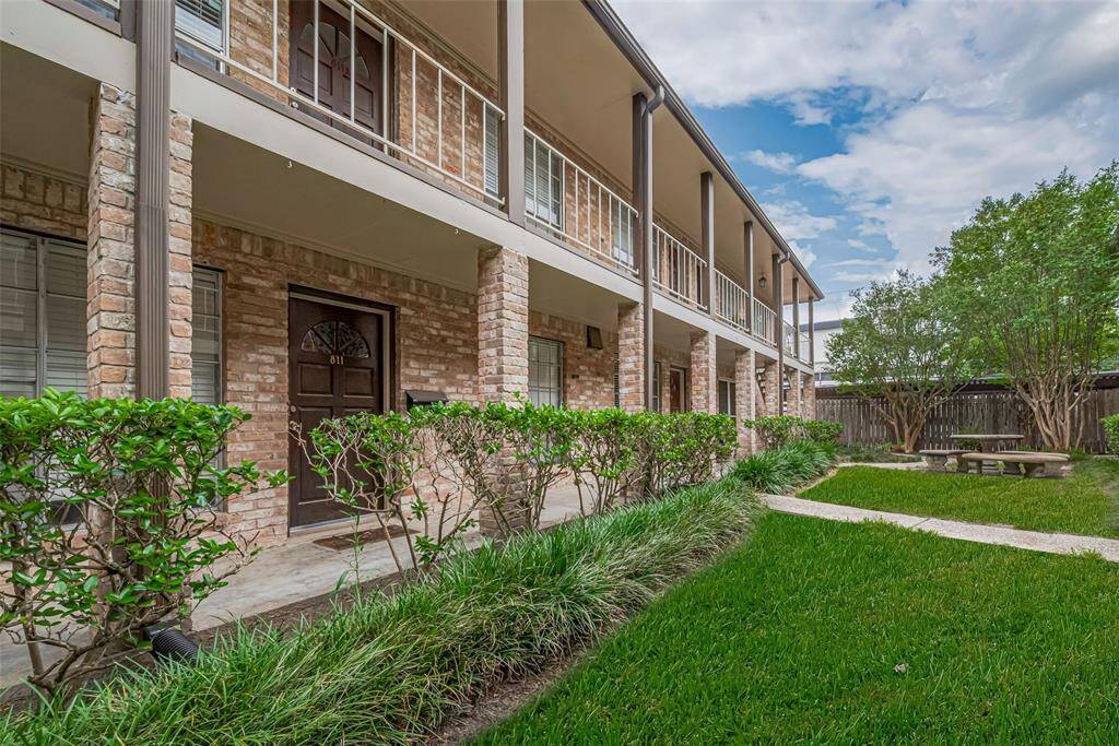 Your parking space is just behind the fence at the end of your Courtyard.